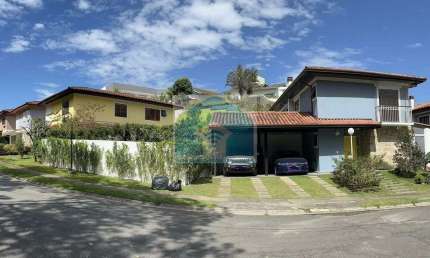 CASA DE CONDOMÍNIO 4 SUÍTES 4 VAGAS COM PISCINA 301m² área útil