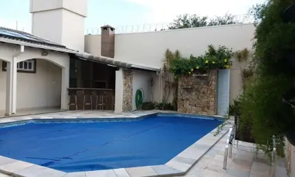 Casa com 4 quartos à venda no Umuarama, Uberlândia  por R$ 1.260.000