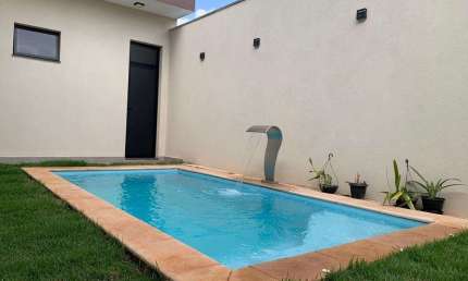 Casa em condomínio fechado com 3 quartos à venda no Grand Ville, Uberlândia  por R$ 1.290.000