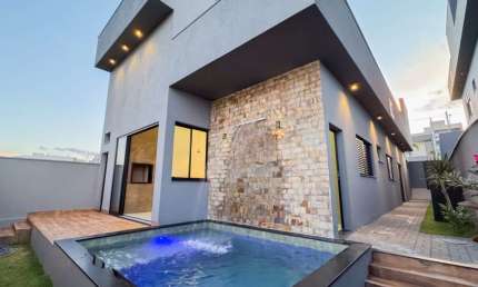 Casa em condomínio fechado com 3 quartos à venda no Granja Marileusa, Uberlândia  por R$ 1.380.000