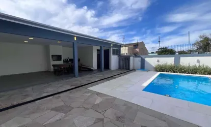 Casa com 3 quartos à venda na avenida engenheiro ary de abreu lima, 311, jardim europa, porto alegre por r$ 990.000