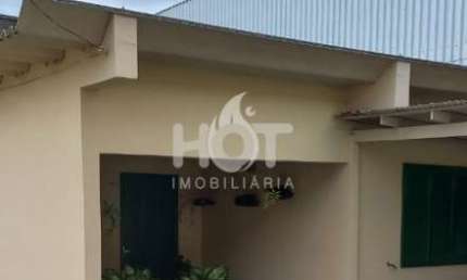 Casa com 4 quartos à venda na Avenida Governador Jorge Lacerda, 2914, Costeira do Pirajubaé, Florianópolis, 150 m2 por R$ 700.000