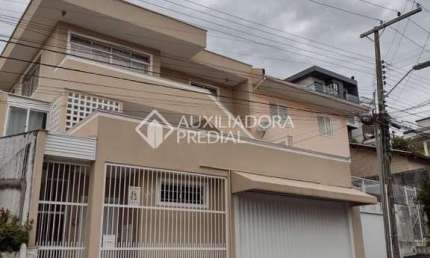 Casa com 3 quartos à venda na Rua Marcelino Simas, 133, Estreito, Florianópolis, 263 m2 por R$ 1.390.000