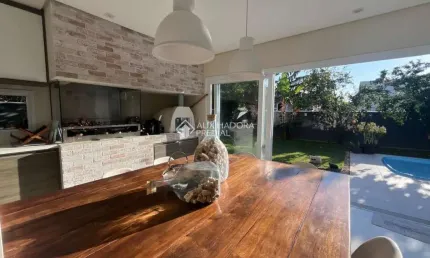 Casa em condomínio fechado com 3 quartos à venda na Rodovia Doutor Antônio Luiz Moura Gonzaga, 3825, Rio Tavares, Florianópolis, 303 m2 por R$ 4.200.000