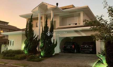 Casa em condomínio fechado com 4 quartos à venda na Rodovia Doutor Antônio Luiz Moura Gonzaga, 3825, Rio Tavares, Florianópolis, 328 m2 por R$ 4.950.000