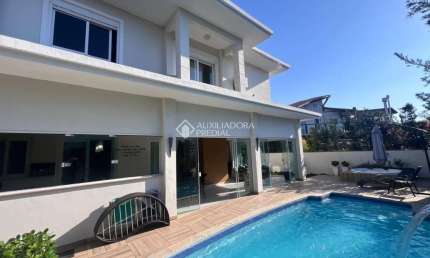 Casa em condomínio fechado com 4 quartos à venda na Rodovia Doutor Antônio Luiz Moura Gonzaga, 3825, Rio Tavares, Florianópolis, 328 m2 por R$ 4.950.000