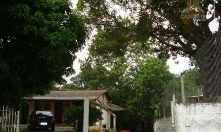 Vendo terreno com 2.850 m²,  frente para a Estrada João de Oliveira Remião
