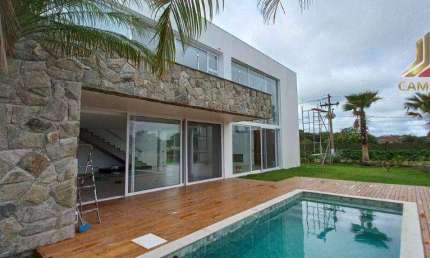 Vendo casa nova no Ilhas Park de Eldorado, casa de quatro suítes e 470,00 m² de área construída