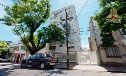 Vendo apartamento de dois dormitórios com garagem e elevador, bairro Floresta em Porto Alegre