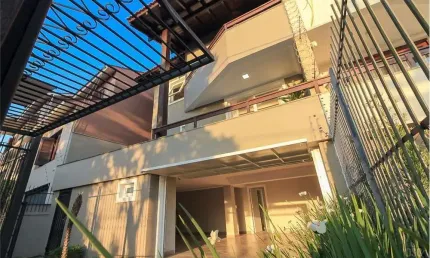 Casa em condomínio fechado com 3 quartos à venda na Rua Alcebíades Antônio dos Santos, 510, Nonoai, Porto Alegre