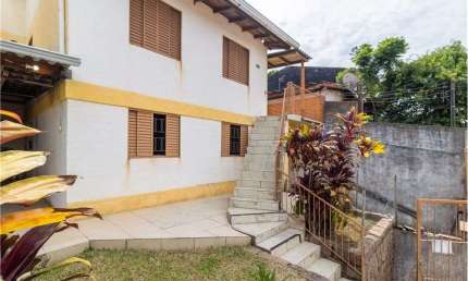 Casa em condomínio fechado com 5 quartos à venda na Rua Carlos Ribeiro da Silva, 199, Partenon, Porto Alegre