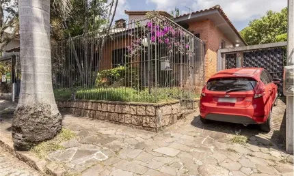 Casa em condomínio fechado com 4 quartos à venda na Rua Professor Fernando Carneiro, 112, Três Figueiras, Porto Alegre