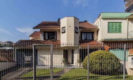 Casa em condomínio fechado com 4 quartos à venda na Rua Dom Diogo de Souza, 180, Cristo Redentor, Porto Alegre