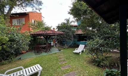 Casa com 4 quartos à venda no Rio Tavares, Florianópolis  por R$ 1.500.000