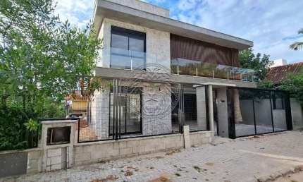 Casa em condomínio fechado com 4 quartos à venda no Campeche, Florianópolis  por R$ 3.985.000