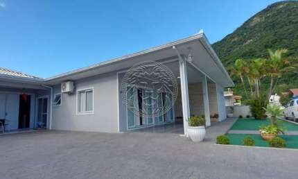 Casa em condomínio fechado com 3 quartos à venda no Armação do Pântano do Sul, Florianópolis  por R$ 1.200.000