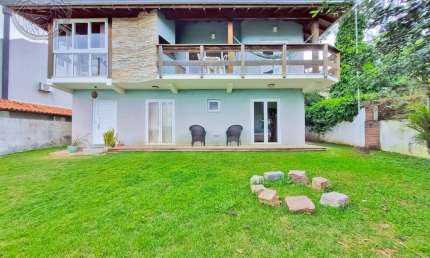 Casa em condomínio fechado com 3 quartos à venda no Campeche, Florianópolis  por R$ 1.980.000