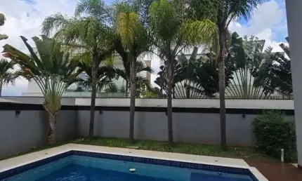 Sobrado no Alphaville Nova Esplanada 1 – 5 Suítes, Área Gourmet Completa e Piscina!