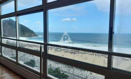 Apartamento localizado no leme, com quatro suítes, duas vagas de garagem