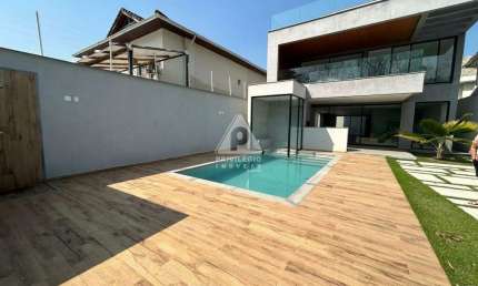 Casa Triplex , 330 m², 5 suítes no Condomínio Interlagos de Itaúna - Barra da Tijuca
