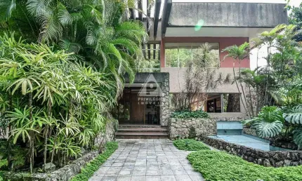 Privilégio imóveis vende: casa na gávea em rua privativa com guarita/segurança.