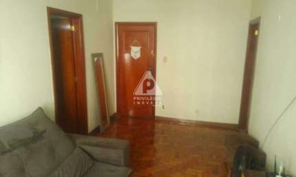 Apartamento sala, um quarto suíte e dependência no Centro