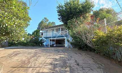Casa com 4 quartos à venda na Avenida João Carlos Viale Dias, Tarumã, Viamão, 333 m2 por R$ 2.110.000