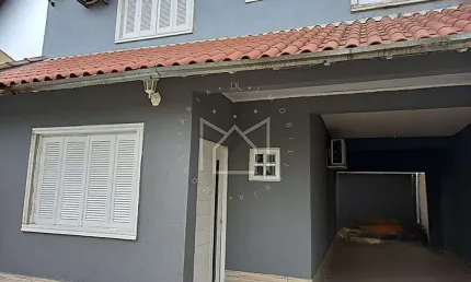 Casa com 3 quartos à venda na Rua Madre Teresa de Calcutá, 445, Loteamento Auxiliadora, Gravataí, 129 m2 por R$ 350.000