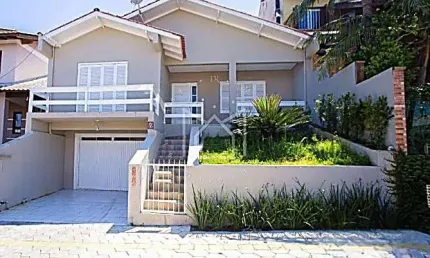 Casa em condomínio fechado com 3 quartos à venda na Rua Sol Nascente, 166, Loteamento Jardim Timbaúva, Gravataí, 170 m2 por R$ 560.000