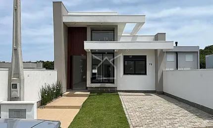 Casa com 3 quartos à venda na Rua Alcides Ferreira da Silva, 13, Loteamento Jardim Timbaúva, Gravataí, 90 m2 por R$ 590.000