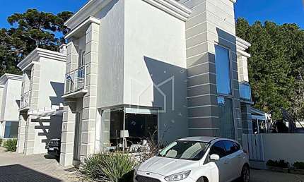 Casa em condomínio fechado com 3 quartos à venda na Rua Vinte E Oito, Parque das Hortênsias, Canela, 141 m2 por R$ 960.000