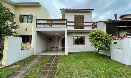 Casa em condomínio fechado com 3 quartos à venda na Rua Ponciano Pacheco da Silveira, Guarujá, Porto Alegre, 155 m2 por R$ 399.000