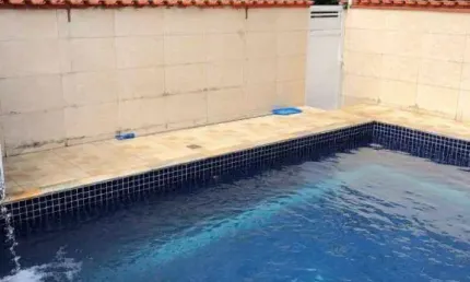 Casa com 2 dormitórios à venda, 110 m² por R$ 450.000 - Jardim Grandesp - Itanhaém/SP