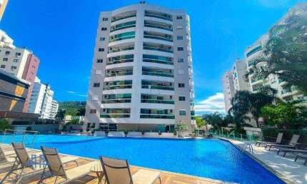 VENDO APARTAMENTO ALTO PADRÃO PRÓXIMO A FIESC, COM 127M², 4 DORMITÓRIOS, 2 SACADAS, COM MÓVEIS PLANEJADOS, 2 GARAGENS, ÁREA DE LAZER COMPLETA.