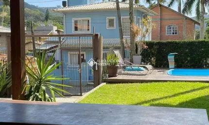 Casa com 3 quartos à venda na Condomínio Canto da Lagoa, 323, Lagoa da Conceição, Florianópolis, 180 m2 por R$ 1.800.000