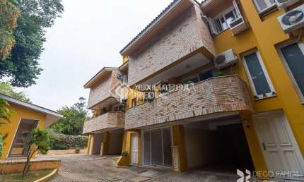 Casa em condomínio fechado com 3 quartos à venda na Rua Almirante Câmara, 262, Tristeza, Porto Alegre, 160 m2 por R$ 695.000