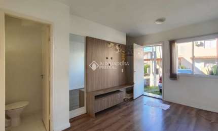 Casa em condomínio fechado com 2 quartos para alugar na Rua Maria Olinda Telles, 900, Canudos, Novo Hamburgo, 103 m2 por R$ 1.500
