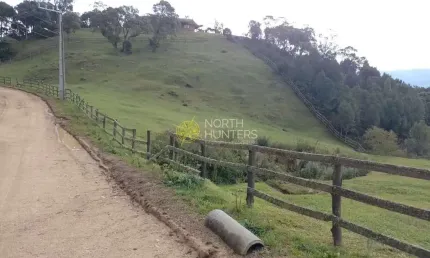 Terreno à venda em condomínio fechado de alto padrão, 4004 m² por R$ 405.000 - Rio Bonito - Rancho