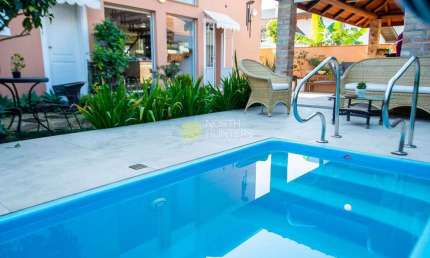 Casa com 4 dormitórios para aluguel de temporada, por R$ 2.000/dia - Jurerê Internacional - Florian