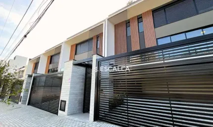 Casa com 3 dormitórios à venda, 285 m² por R$ 2.481.222,30 - América - Joinville/SC