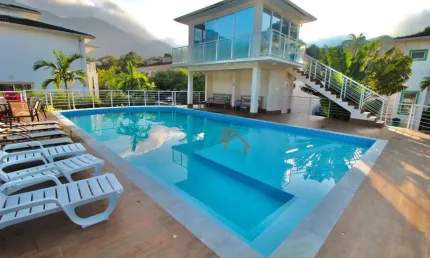 Casa com 2 dormitórios, 89 m² - venda por R$ 820.000,00 ou aluguel por R$ 5.000,00/mês - Maresias - São Sebastião/SP