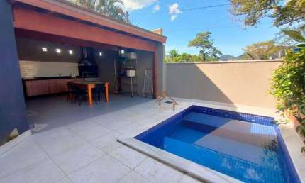 Casa com 4 dormitórios, 136 m² - venda por R$ 1.650.000,00 ou aluguel por R$ 11.500,00/mês - Camburi - São Sebastião/SP