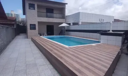 Sobrado para venda tem 250 metros quadrados com 4 quartos em Vila Atlântica - Mongaguá - SP