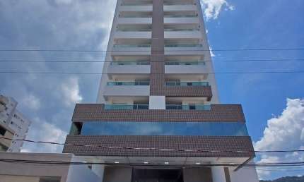 Lindo apartamento no centro de Mongaguá, prédio frente ao mar lazer completo