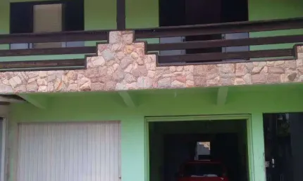 Sobrado com 4 dormitórios à venda, 380 m² por R$ 1.200.000,00 - Praia de Armação - Penha/SC