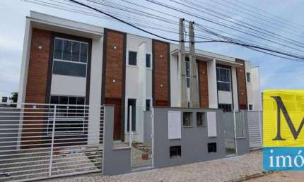 Sobrado com 3 dormitórios à venda, 100 m² por R$ 649.000,00 - Meia Praia - Navegantes/SC