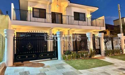 Casa com 5 quartos à venda na Rua Inambuí, 10, Atlântida, Xangri-Lá por R$ 3.500.000