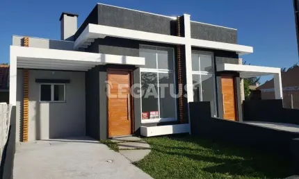 Casa com 2 quartos à venda na Espanha, 252, Zona Norte, Capão da Canoa por R$ 500.000