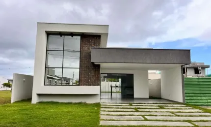 Casa com 3 dormitórios à venda, 129 m² por R$ 820.000,00 - Alphaville Camaçari - Camaçari/BA