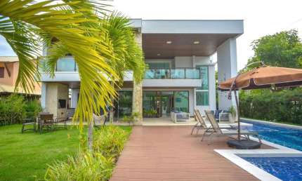 Casa com 5 dormitórios à venda, 572 m² por R$ 5.200.000,00 - Loteamento Guarajuba - Camaçari/BA